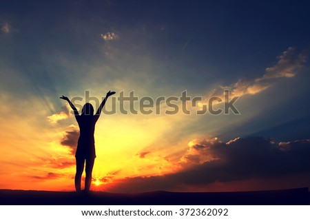 Silhouette, Free Happy Woman Relaxing Nature sky and sunset. Outdoor. Freedom concept. 