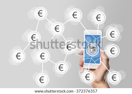 Mobile e-payment and e-commerce concept with hand holding modern smartphone in front of neutral grey background  Royalty-Free Stock Photo #372376357