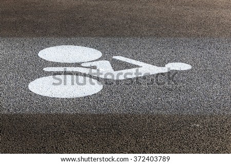 Bicycle lane sign on the road 