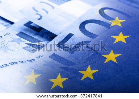European union flag on a euro money background. Royalty-Free Stock Photo #372417841