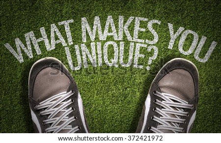 Top View of Sneakers on the grass with the text: What Makes You Unique?