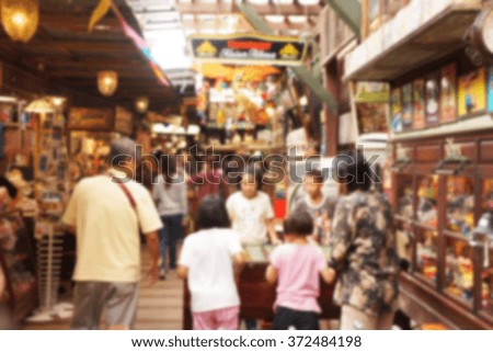 blur picture , people walk in Thai vintage market