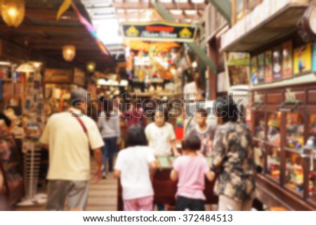 blur picture ,people walk in the Thailand vintage  market