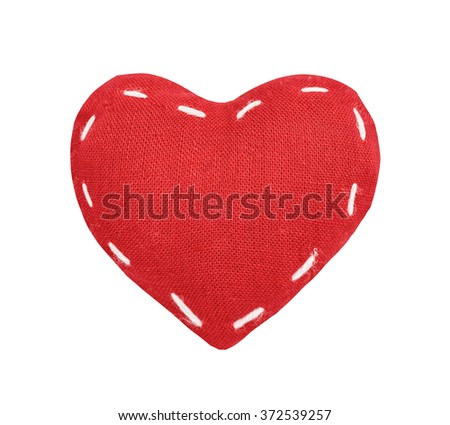 Red textile, fabric heart, St. Valentine's Day, close up, isolated on the white