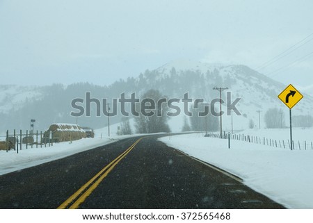 Snowstorm on highway near Yampa,  Colorado