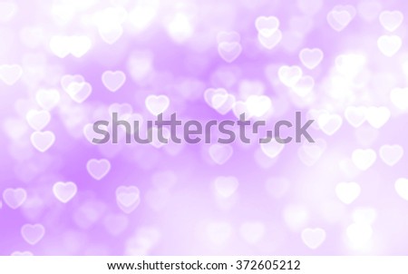 Purple heart-shaped bokeh background