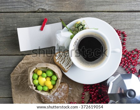 Heart shaped cookies (big and small as couple), cup of coffee, bouquet of flowers decoration. sunny morning.Steam (geyser) coffee maker. Romantic breakfast or Valentine's Day Breakfast. Toned image