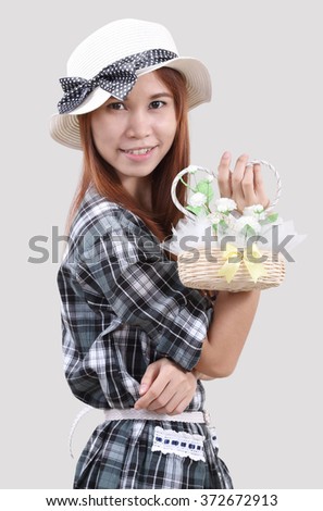 Image of woman hold flowers bag with blurred background 