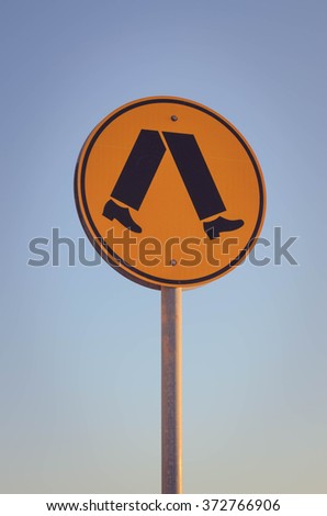 Pedestrian crossing Australian warning road sign walking legs