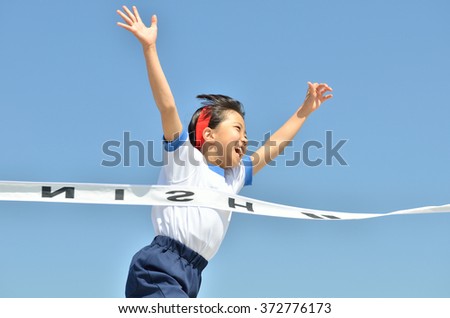 sports day, Footrace, young girl Royalty-Free Stock Photo #372776173