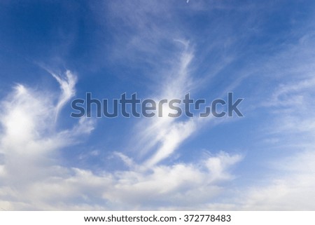   photographed blue sky with light clouds on it