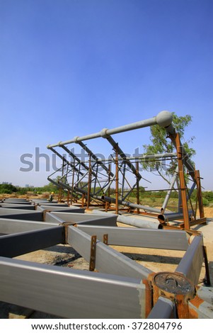 Gray steel structure in construction site, closeup of photo