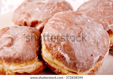 Homemade fresh donuts, doughnuts on white background.