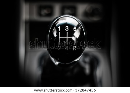 manual gearbox in the car macro black Royalty-Free Stock Photo #372847456