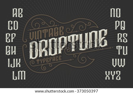 Retro font with decorative frame in shape of gothic guitar