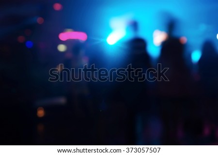 blur people at party in pub at night background Royalty-Free Stock Photo #373057507