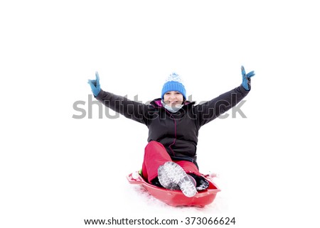Happy women smiling sledding on snow, winter background