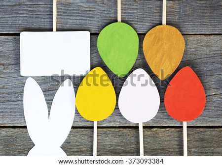 Happy Easter paper Rabbit Bunny Easter egg and poster on wooden Background