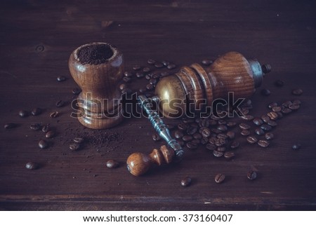 Coffee beans and grinder