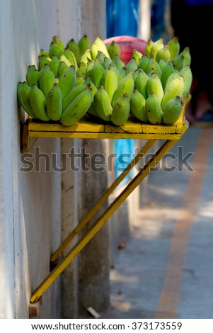 raw bananas on the shelves