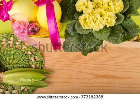 EASTER composition on a wooden background