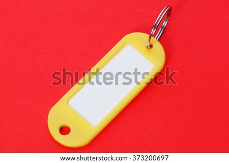 close up of a red yellow fob