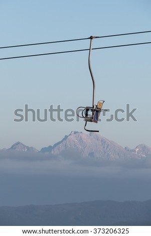 Ski lift above the clouds