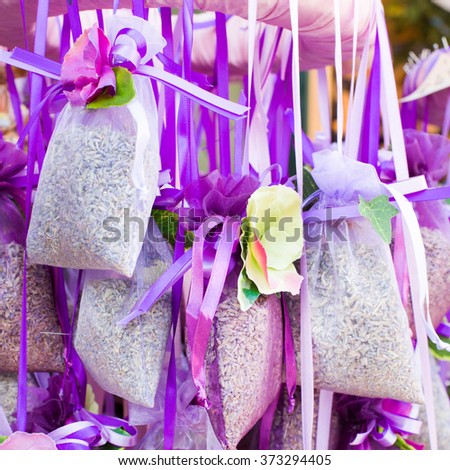 Many lavender Easter decoration aroma bags with grain at the market