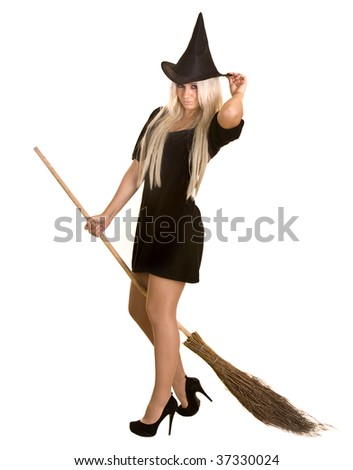 Halloween witch blond in black dress and hat on broom.Isolated.