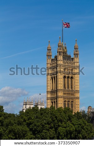 The Victoria Tower in London during the summer with the Union Jack Flag flying at the top of it