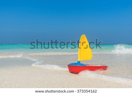 toy ship on the sea background