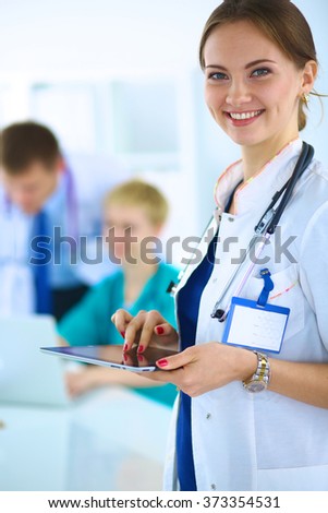 Woman doctor standingat hospital