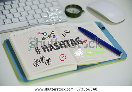 drawing HASHTAG concept on notebook in the office , business concept , business idea