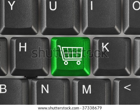 Computer keyboard with shopping key - internet concept