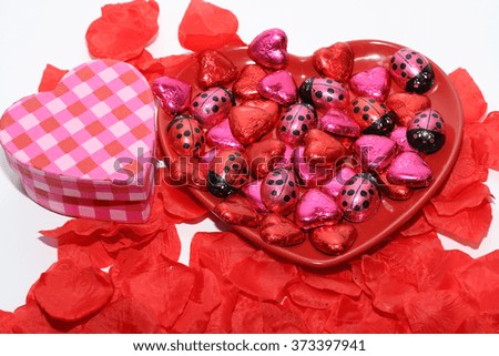 An image showing the concept of Valentines day with Heart shaped gift box and chocolates / Chocolates for Valentines day