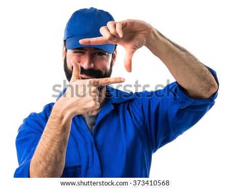 Plumber focusing with his fingers