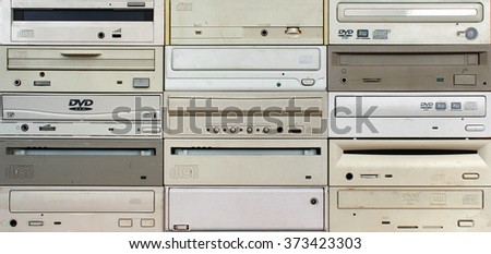 Front panels of old cd and dvd drives as background