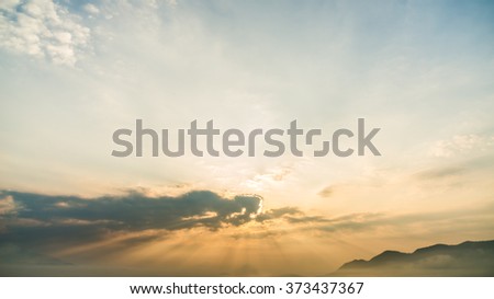 Cloud moving over colorful sky background