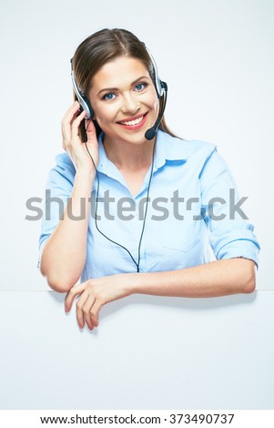 Toothy smiling help line customer service operator. Isolated portrait with white sign board.