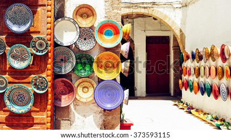 Traditional arabic handcrafted, colorful decorated plates shot at the market in Marrakesh, Morocco, Africa. Royalty-Free Stock Photo #373593115