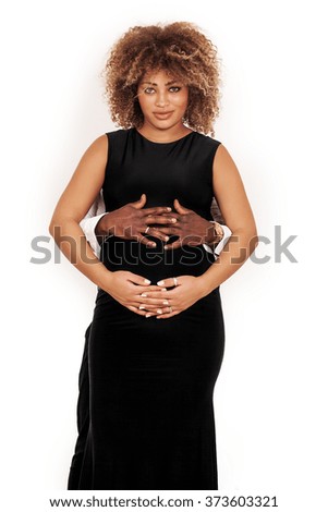 Pretty pregnant woman portrait with her boyfriend's hands