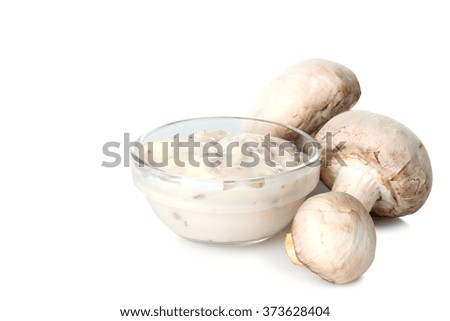 tasty mushroom sauce in bowl isolated on white background