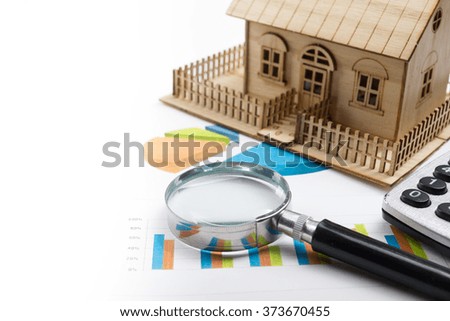 Model house, construction plan for house building, magnifying glass compass. calculator. Real Estate Concept. Top view.