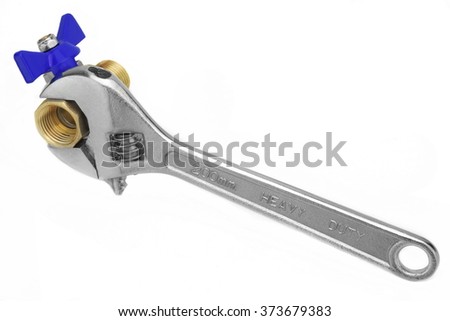 Ball Valve Grabbed With Adjustable Heavy Duty Wrench Isolated On White Background, Close Up, High Angle View
