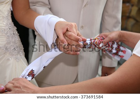 bound together wedding hand towel bride and groom