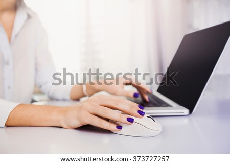Young adult using laptop
