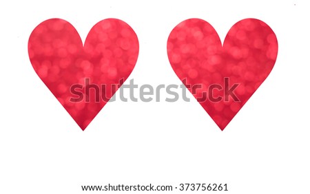 Bright and abstract blurred red, pink and violet hearts with shimmering glitter isolated on white