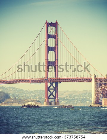 Old film retro style Golden Gate Bridge in San Francisco, USA.