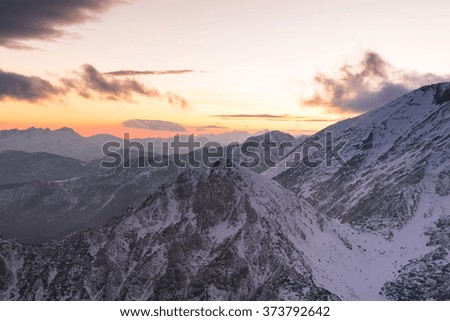 Vivid and magnificent sunset in the mountains.