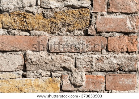 texture - old red brick with plaster, detail